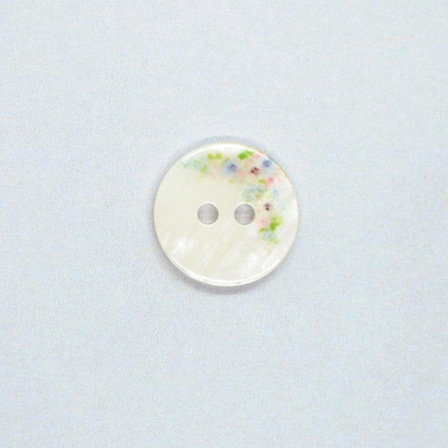 Perlemorsknap look med blomster