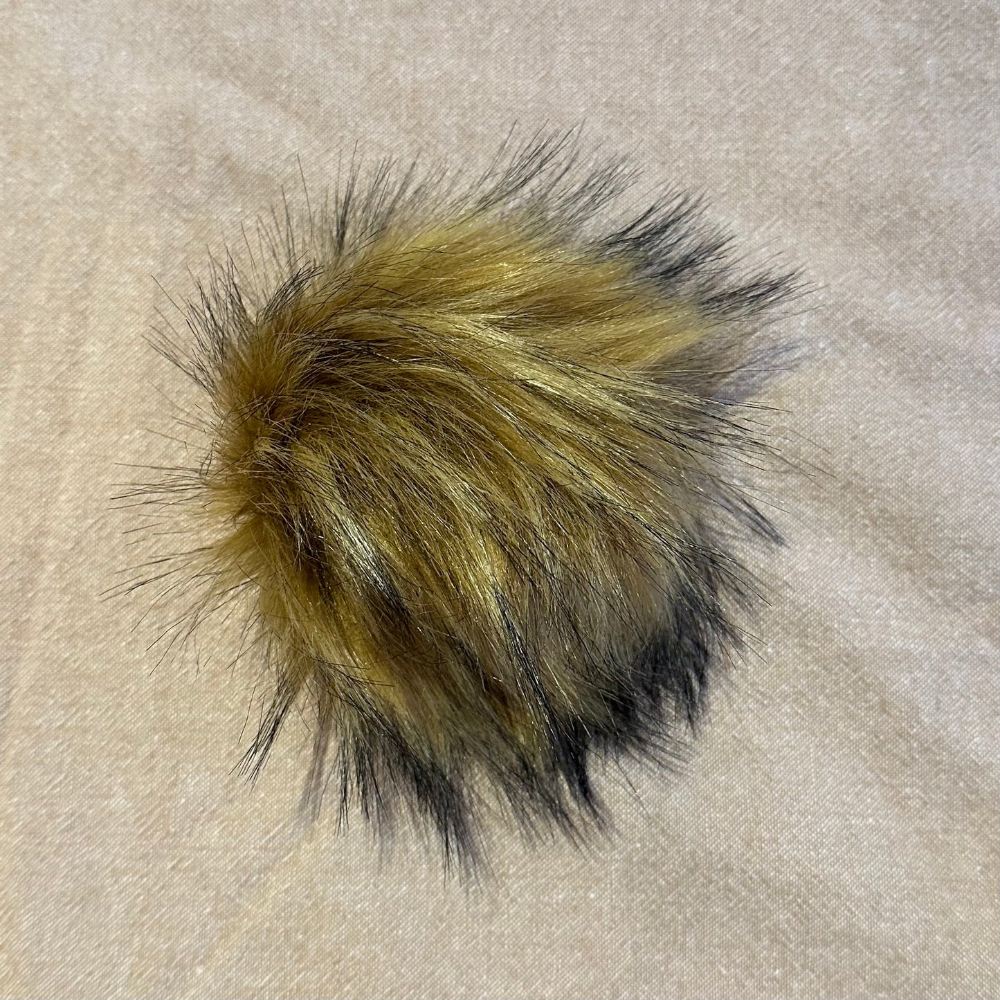 Pompon med trykknap